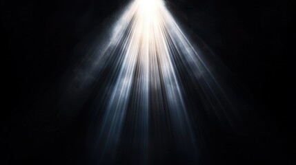 Bright light rays beam on dark background.