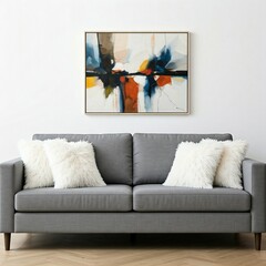 A contemporary living space with a dark grey Dale sofa as the focal point, complemented by fluffy white cushions and a bold abstract painting.
