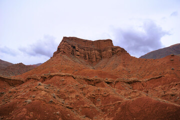 canyon landscape with red rocks in Kyrgyzstan, Central Asia
