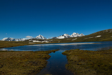 Mongolian rugged mountains with beautiful lakes, cloudes