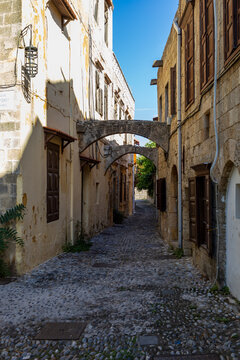 Fototapeta Beautiful streets and buildings of the old town of Rhodes in Greece