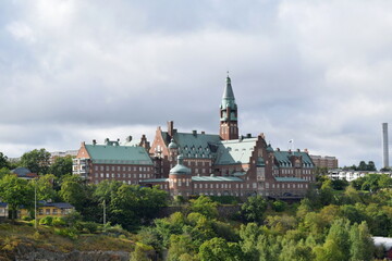 Obraz premium Danvikshem is a retirement home in Stockholm, Sweden. View from Saltsjön bay of the Baltic Sea.