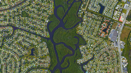 River separating cities, river between two settlements, looking down aerial view from above, Bird’s eye view st lucie river, port st lucie, Florida, USA 
