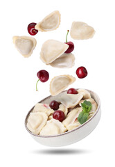 Dumplings (varenyky) with cherries and bowl in air white background