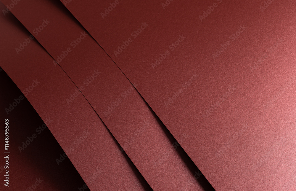 Poster burgundy red metallic paper texture with a pearlescent finish and a sleek, smooth surface. the warm 