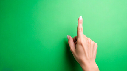 Index finger clicking on green screen 