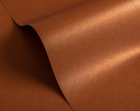 Copper and rust paper texture with a glossy metallic finish and subtle wavy patterns. The warm earthy tones of orange, brown, and terracotta create a rich, elegant design with a