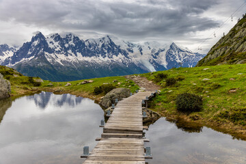 Nasty weather in the Alps. Dark cloudy sky and overcast before the rain and storm. Stormy weather....