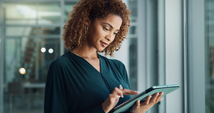 Tablet, business woman and review with creative research, idea or reading news for publishing in startup office. Digital technology, manager and planning project, communication and problem solving