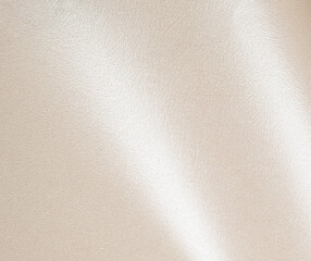 Ivory champagne paper texture with a luminous pearl-like sheen and smooth, fibrous surface. The warm, elegant tones and subtle gradient create a rich and refined design, ideal for