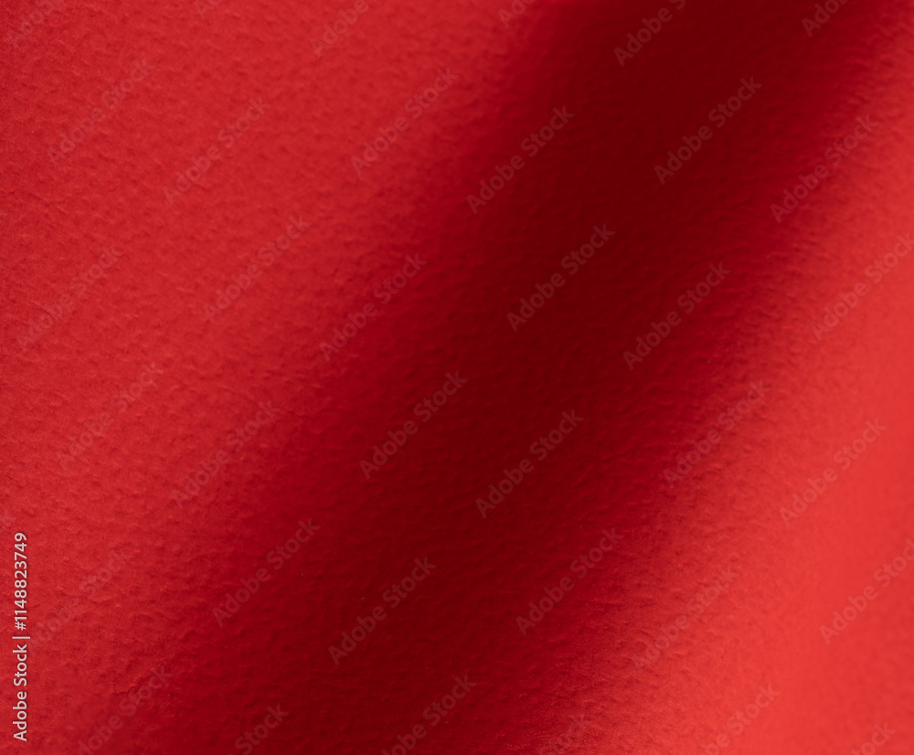 Aufkleber Rich scarlet paper texture with a grainy, perforated surface and soft gradients of crimson and ruby tones. The warm, matte finish and bold monochrome design exude luxury, making it