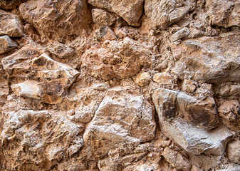 Background photography of grunge wall of old house in Mallorca, Spain, fence; cement; concrete; abstract pattern; textured; terracotta