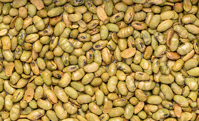 Macro photography of dry roasted edamame with sea salt, young soybeans, gluten-free alternative snack, healthy vegan food, dietary fibre