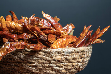 Dried Red Pepper on a Wooden Plate on a Turntable