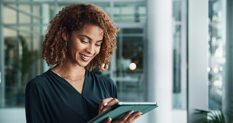 Woman, smile and tablet in office for business, positive review or article feedback on website. Journalist, tech or happy in agency for planning, corporate news or research for publishing opportunity