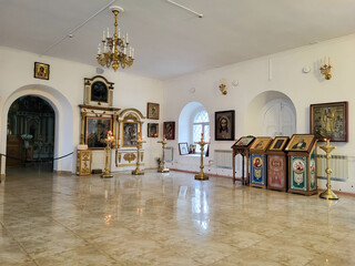 Russia, Kotlas 09.12.2024. Icons and decorations in a simple city church.