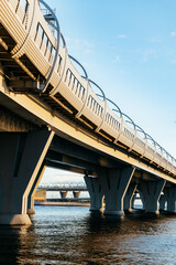 bridge over the water, an expressway against the sky. Transport architecture, engineering...