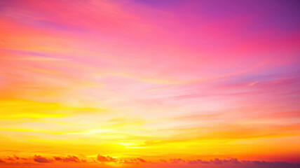 Obraz premium A radiant sunrise gradient featuring harmonious blends of orange, yellow, and pink hues, creating a warm and uplifting atmosphere, ideal for backgrounds or inspirational themes.