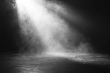 Fototapeta premium Volumetric light beam shining through smoke fog on dark concrete floor background
