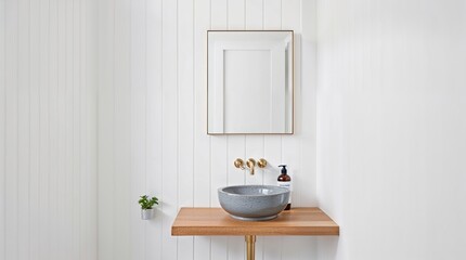 Fototapeta premium modern bathroom interior with a minimalist design. The layout features a wooden countertop with a round, gray stone sink basin.