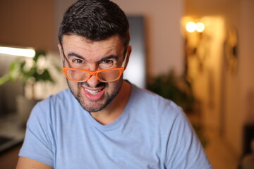 Fototapeta premium Man trying to see through dirty eyeglasses 