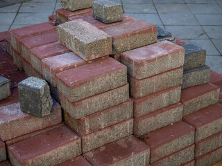 Block with paving stones on the street. Preparation for pavement repair