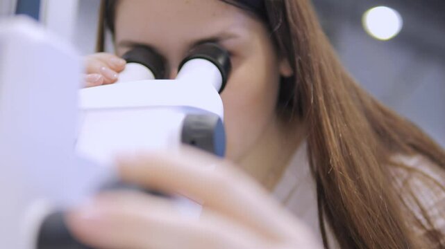 A Young Scientist Engaging in InDepth Research Using a Microscope Within a Laboratory Setting