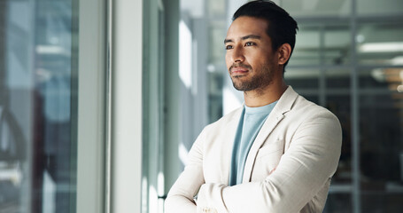 Office, thinking or Asian man with ideas, arms crossed and future plan for creative problem solving. Window, serious or proud business advisor daydreaming of profit growth, inspiration or opportunity