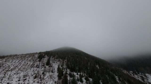 mountains from drone in clouds
