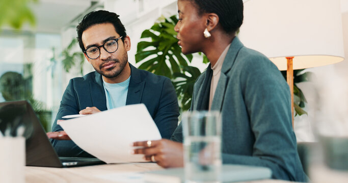 Office, team meeting and feedback for laptop, proposal and research notes with document for report. Man, woman and advice for small business, teamwork and collaboration for partnership or b2b project