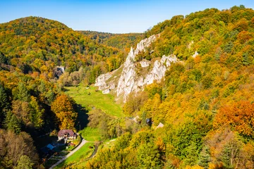 Selbstklebende Fototapeten Limestone rocks in autumn fall landscape of Ojcow National Park, Poland © pkazmierczak