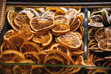 Close up of dried orange and lime slices, showcasing the textures and colors of preserved citrus...