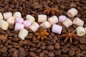 Coffee beans, star anise and marshmallows background