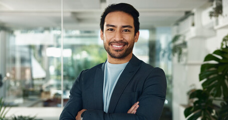 Portrait, arms crossed and smile with business man in office for advocate, confidence and attorney clerk. Professional, legal counsel and opportunity with male employee in law firm of Indonesia