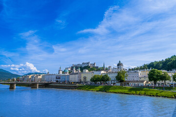 Naklejka premium The City of Salzburg with Salzach River and Fortress Hohensalzburg in the State of Salzburg in Austria.