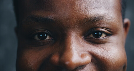 Black man, eyes and portrait in studio closeup for sight, optometry and vision. Person, reflection...