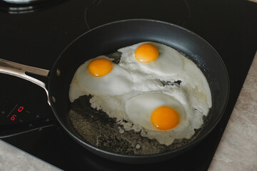 Fresh eggs sizzling in the pan — a delicious start to the day, filled with aroma and energy