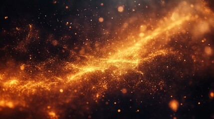 Fototapeta premium Glowing golden particles floating in dark space