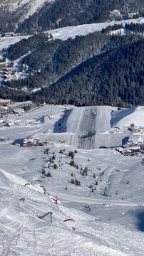 Aerial view of Courchevel airport runway by winter 