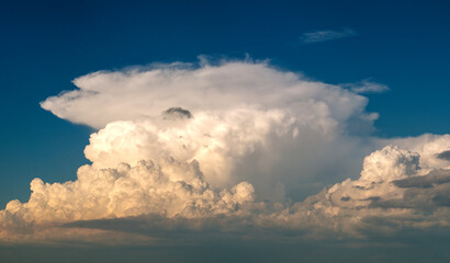 Florida weather. Blue sky with white summer rain clouds. Colorful summer landscape