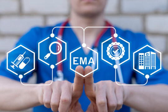 Doctor working on virtual touch screen presses abbreviation: EMA. Concept of EMA European Medicines Agency. Drugs evaluation and quality control, pharmacy medical standards compliance department.