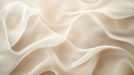 Obraz premium Soft flowing fabric in beige and white tones creating a delicate and elegant textured background