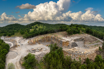 Sand open-pit mining quarry with processing plant for crushed stone. Extracting of natural resources for construction industry