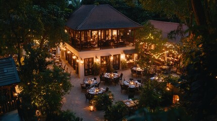 Charming Outdoor Dining Space with Twinkling Lights at Night