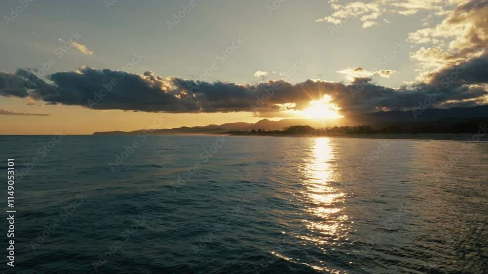 Wall mural sunset with religious sky and empty flat ocean in winter