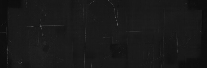 Fototapeta premium Gritty black distressed surface with rough texture and grunge elements, black, abstract, worn