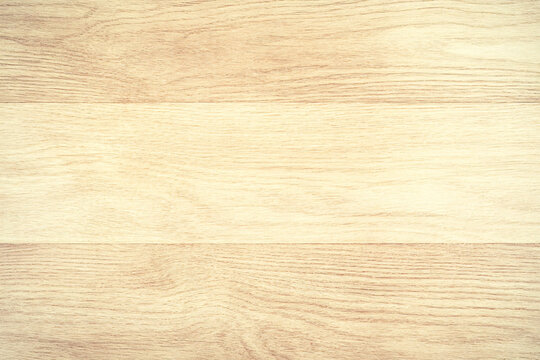 a seamless light wood texture with soft grain patterns and a smooth finish in a natural beige tone  
