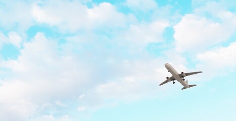 ULTRA HD. Airplane flies in blue sky. Travel, tourism. Airplane takes off against the background of blue sky.	

