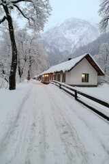 Fototapeta premium Snowy retreat - picturesque view of mountain village, with cozy cottages blanketed in snow, framed by majestic peaks, calm and enchanting atmosphere of a serene winter landscape.