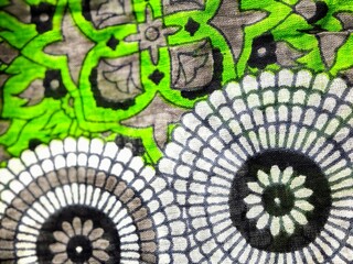 Neon green and black circular patterns 